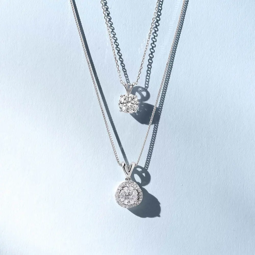 Image 22: Elegant pendant necklace featuring a round-cut diamond